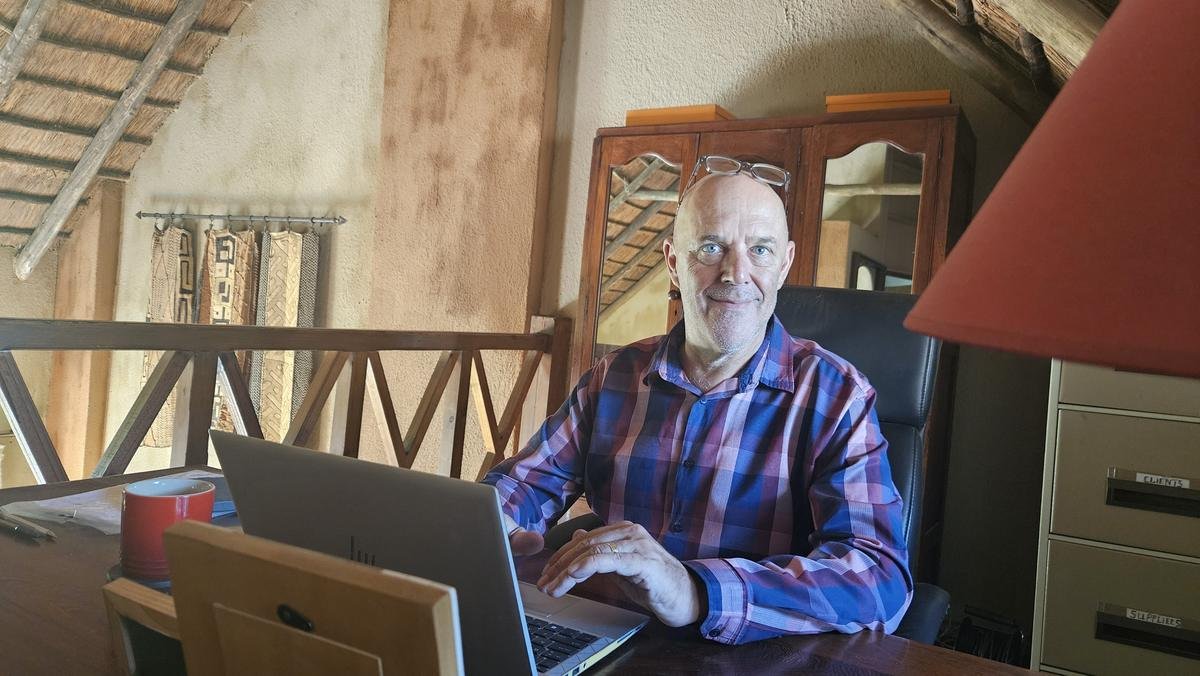 Arnold Graaff, founder of Code College, working at his laptop